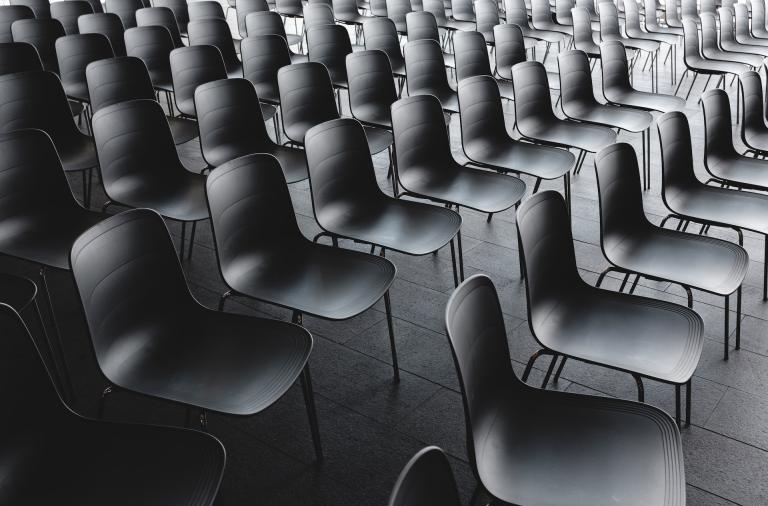 Hall filled with empty school chairs