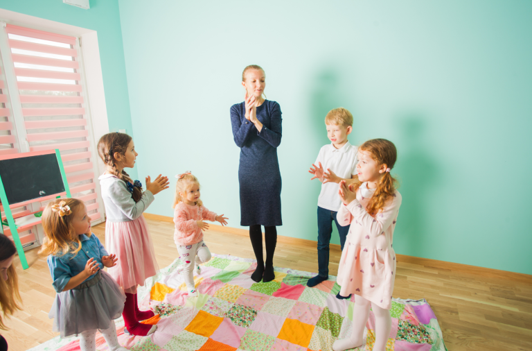 Early Years children with teacher