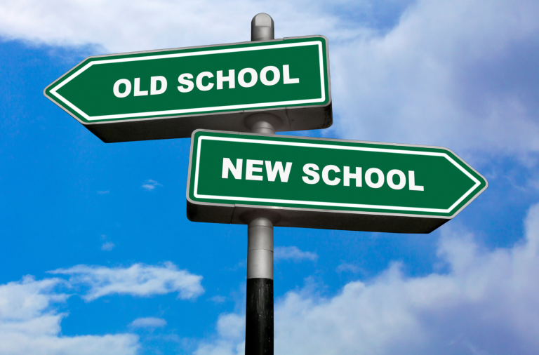 street sign showing 'old school' 'new school'
